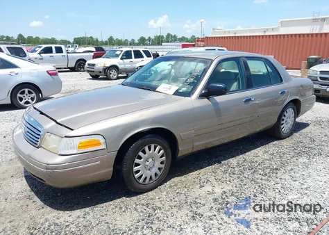 2001 Ford Crown Victoria from USA, damaged, VIN 2FAFP73W71X194548